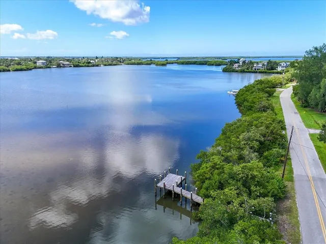 an aerial view of a garden with lawn chairs