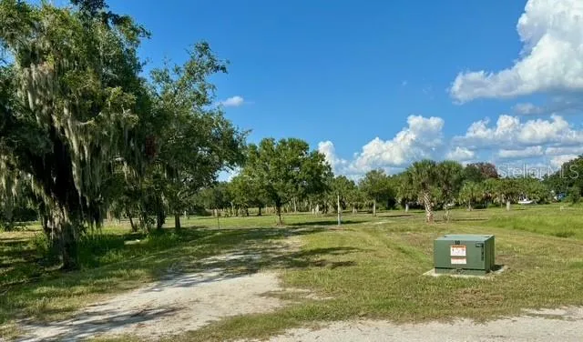 a view of a outdoor space with swimming pool