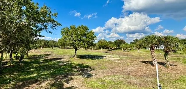 a view of a ocean with a yard