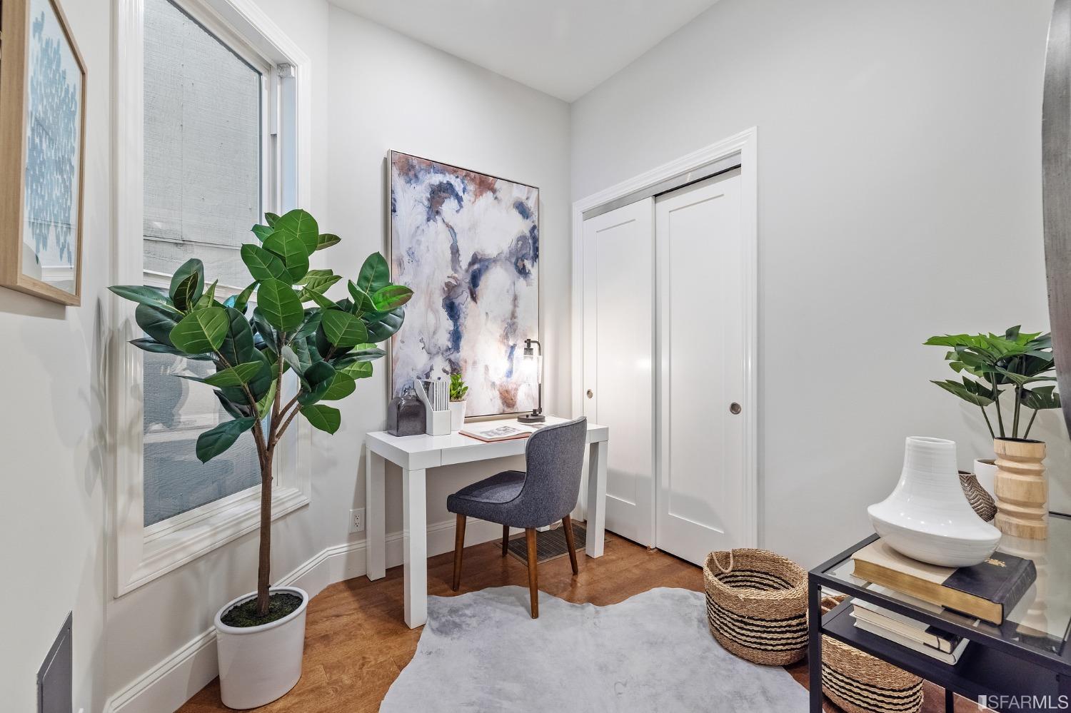 558 Central Avenue San Francisco, CA 94117 - Photo 17 of 23 a view of a workspace with furniture and a potted plant