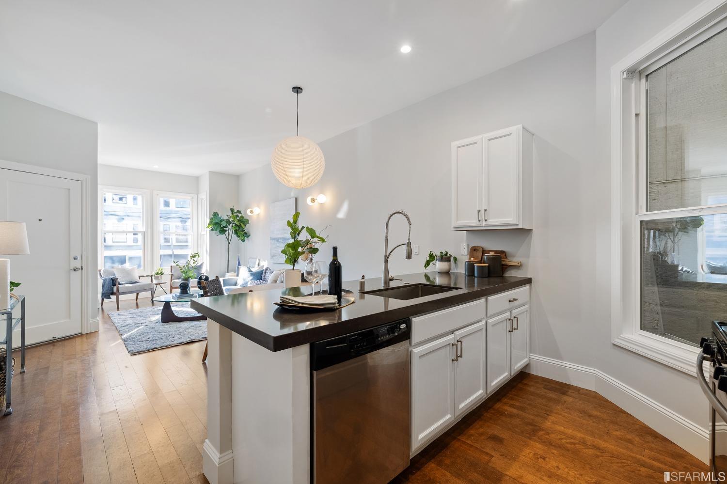 558 Central Avenue San Francisco, CA 94117 - Photo 4 of 23 a kitchen with sink stove and cabinets
