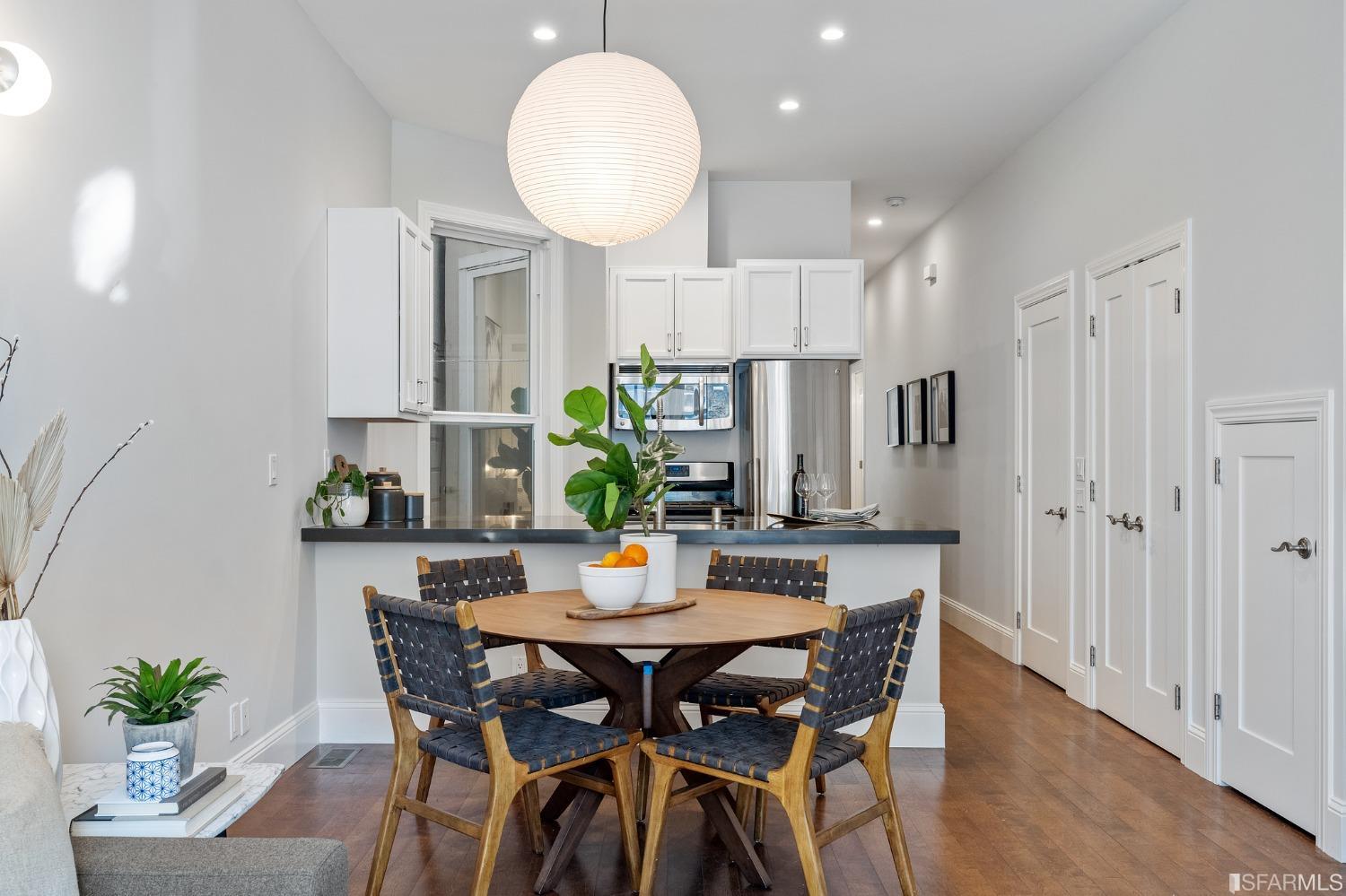 558 Central Avenue San Francisco, CA 94117 - Photo 6 of 23 a view of a dining room with furniture and wooden floor