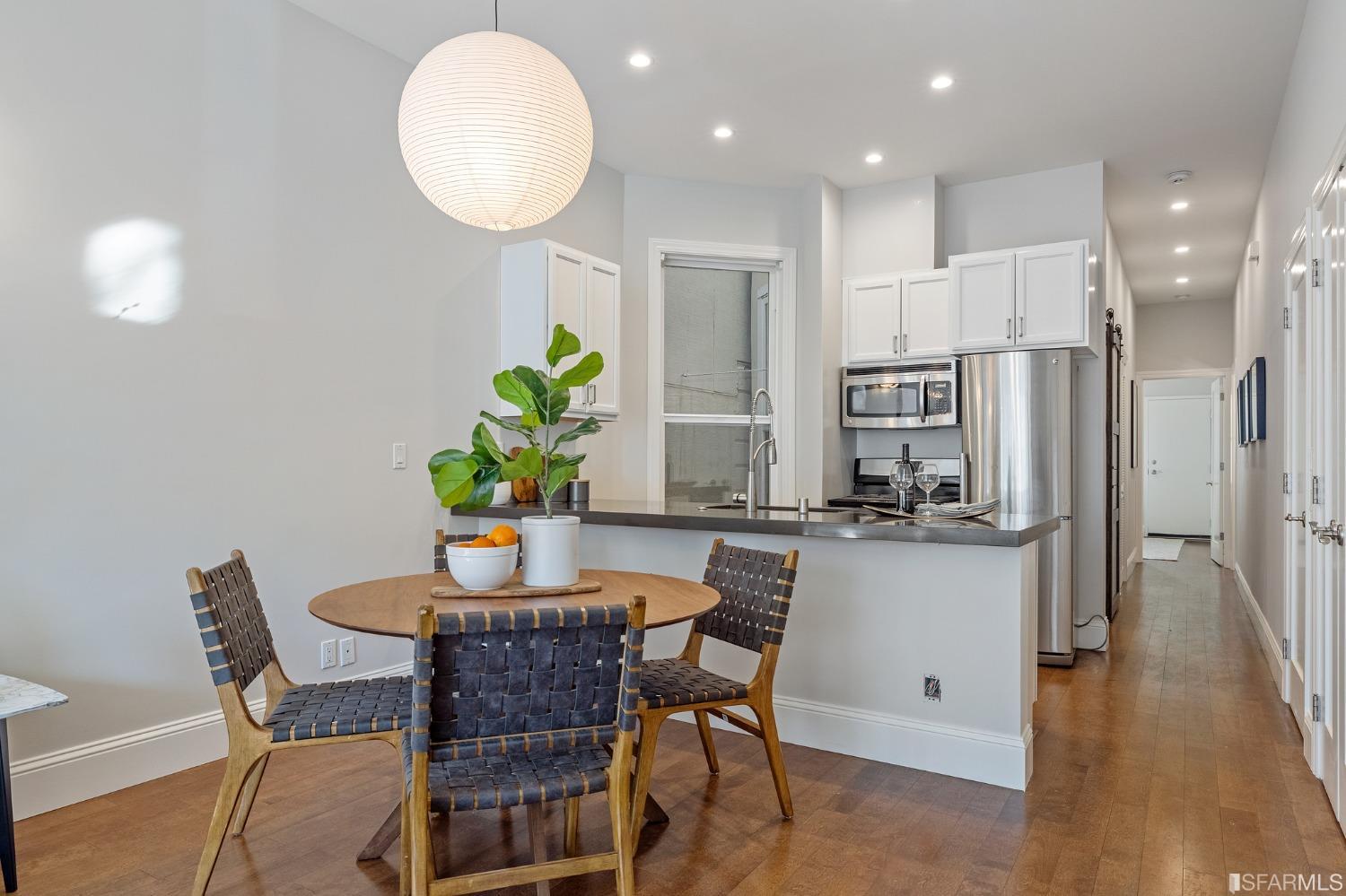 558 Central Avenue San Francisco, CA 94117 - Photo 7 of 23 a dining room with furniture and wooden floor