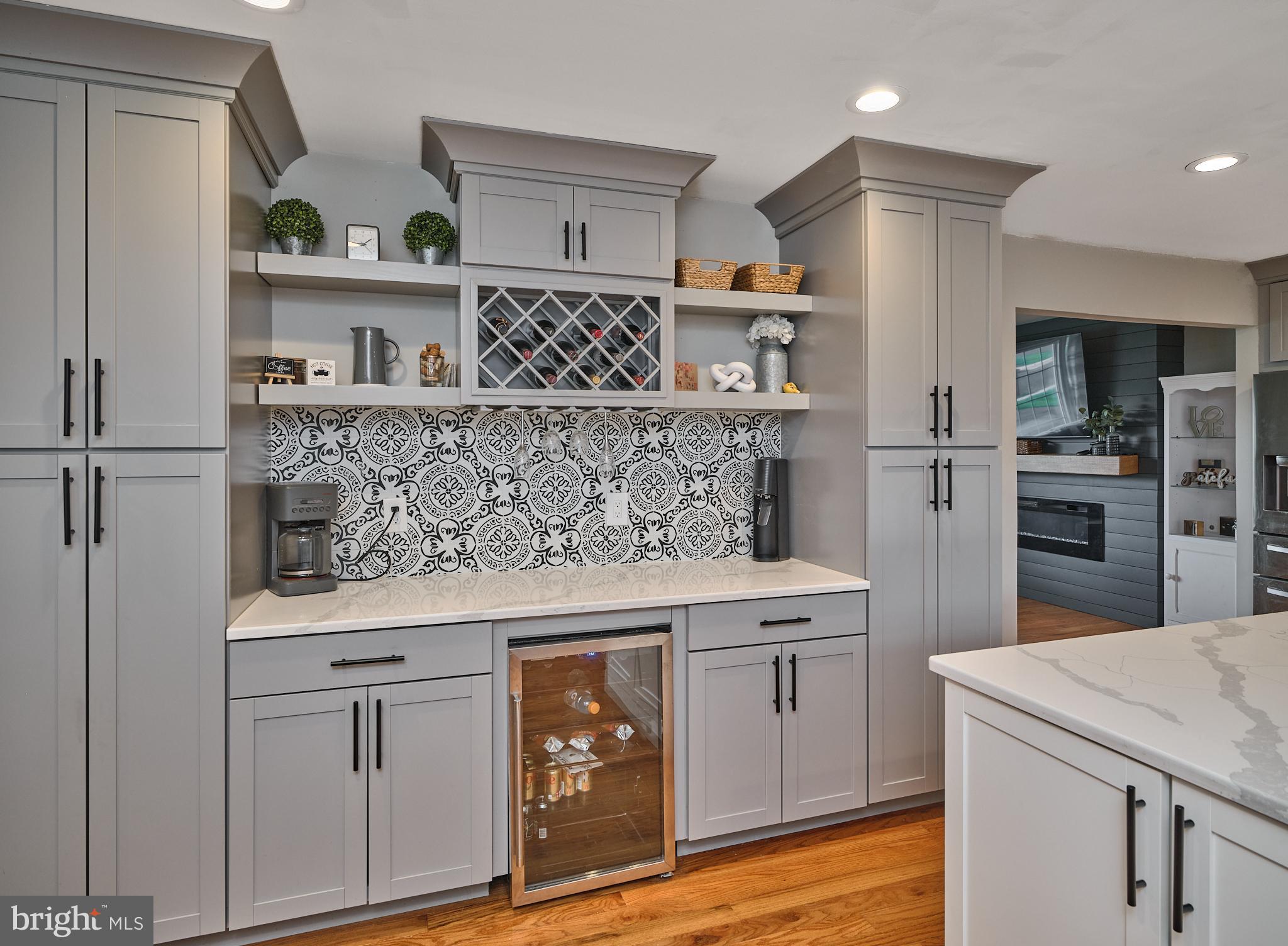 10 Welland Road Hamilton, NJ 08690 - Photo 13 of 28 Beverage area flanked by pantry cabinetry