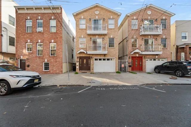 a cars parked in front of a building
