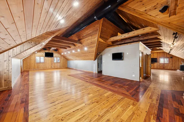 a view of a patio with wooden floor