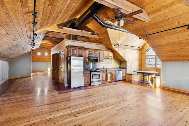 a view of a livingroom with furniture and window