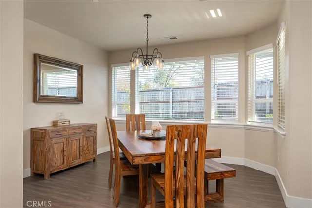 a kitchen with stainless steel appliances granite countertop a refrigerator sink and cabinets