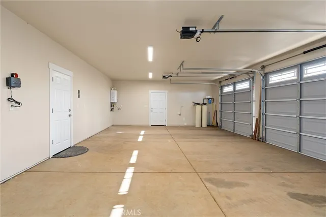a view of a backyard with sitting area