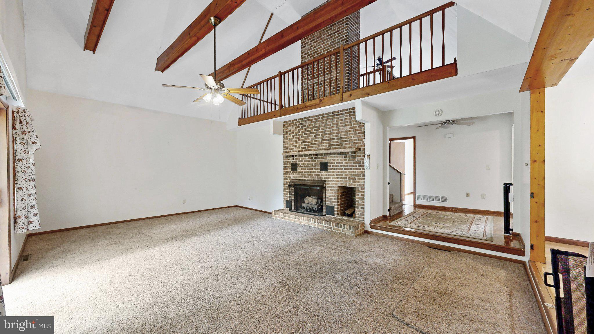 163 Pratts Branch Road Felton, DE 19943 - Photo 11 of 55 Spacious living area with vaulted ceilings.