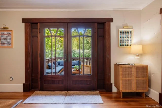 a view of front door with stairs