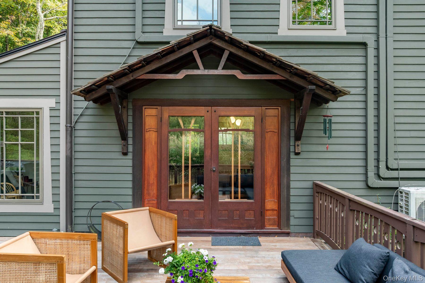 64 Lower Byrdcliffe Road Woodstock, NY 12498 - Photo 18 of 36 a front view of a house with garden