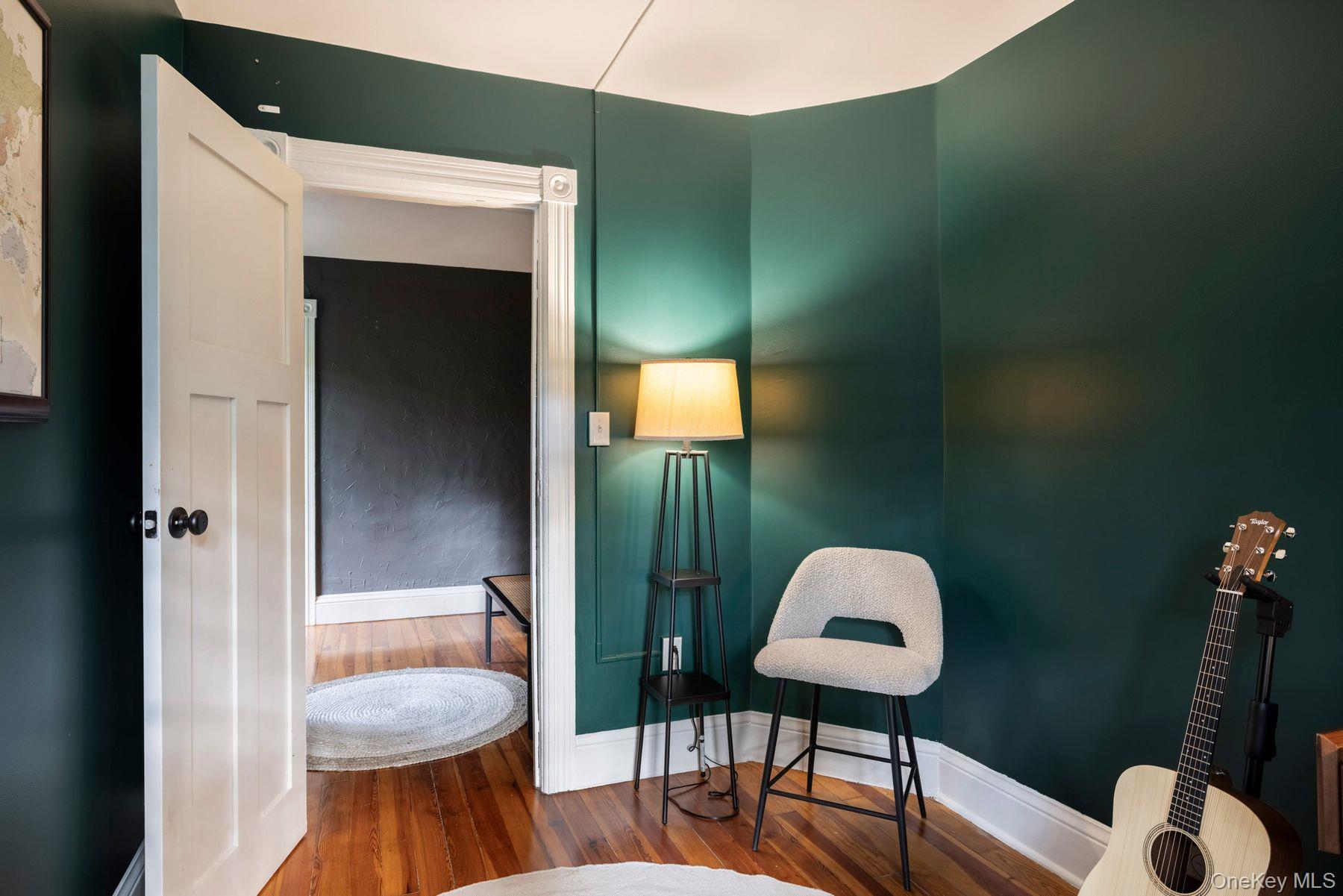 64 Lower Byrdcliffe Road Woodstock, NY 12498 - Photo 22 of 36 a living room with furniture and a toilet