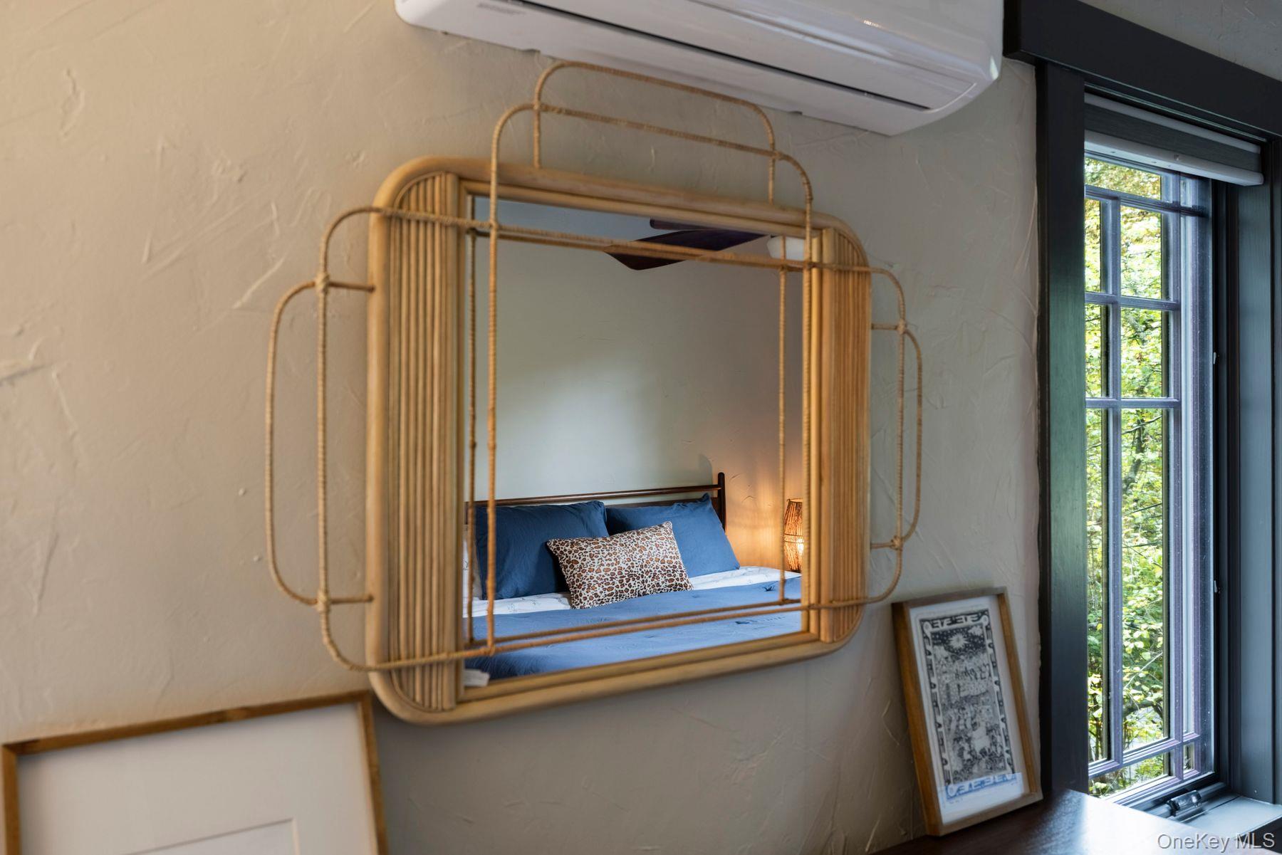 64 Lower Byrdcliffe Road Woodstock, NY 12498 - Photo 25 of 36 a living room with furniture and a window