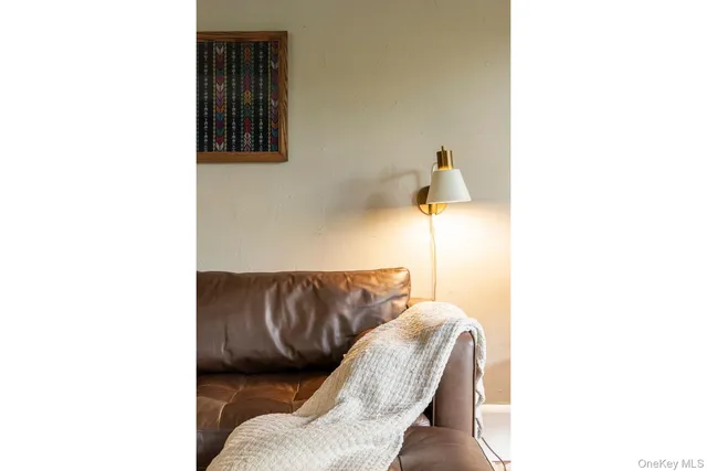 a living room with furniture and window