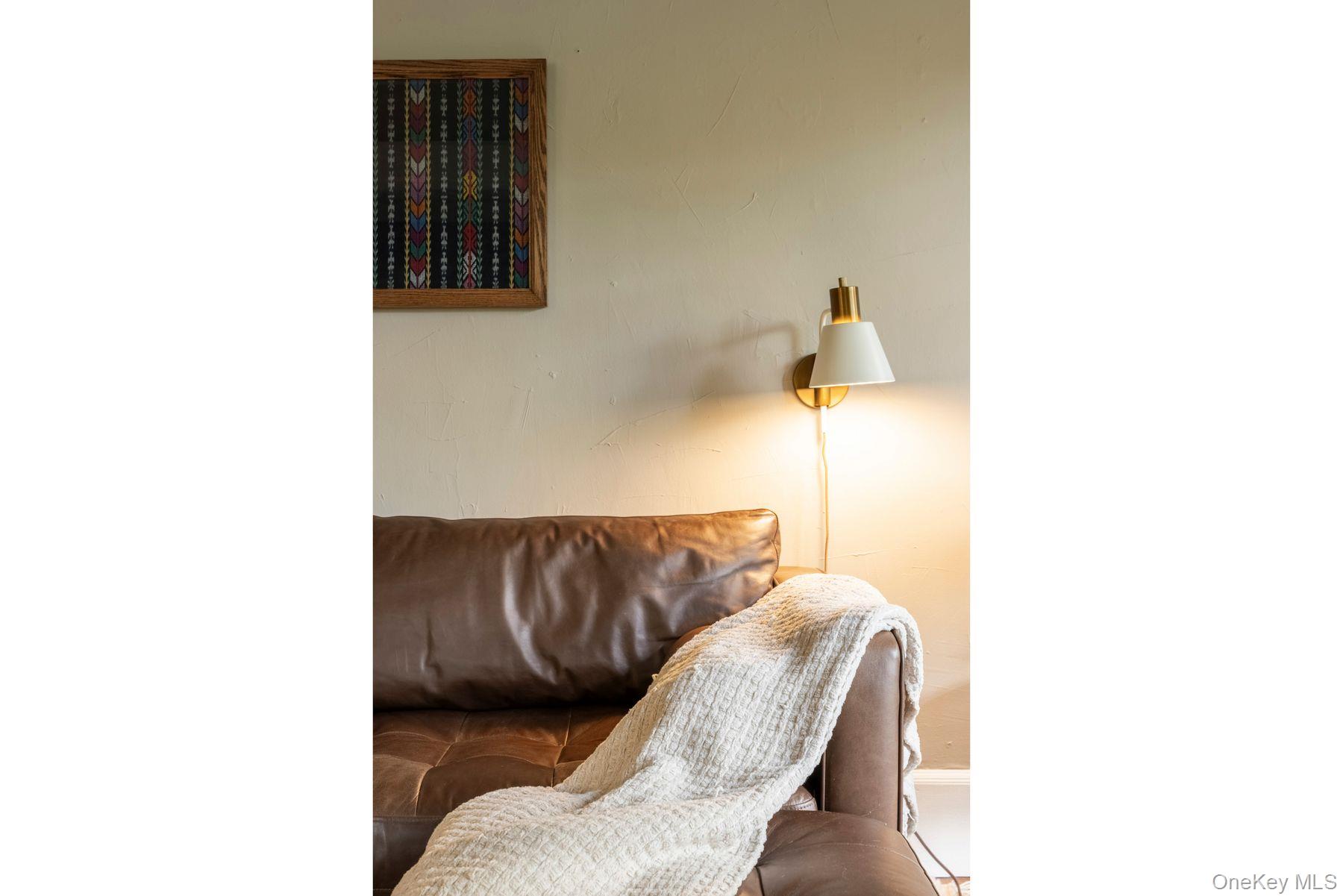 64 Lower Byrdcliffe Road Woodstock, NY 12498 - Photo 9 of 36 a living room with furniture and window