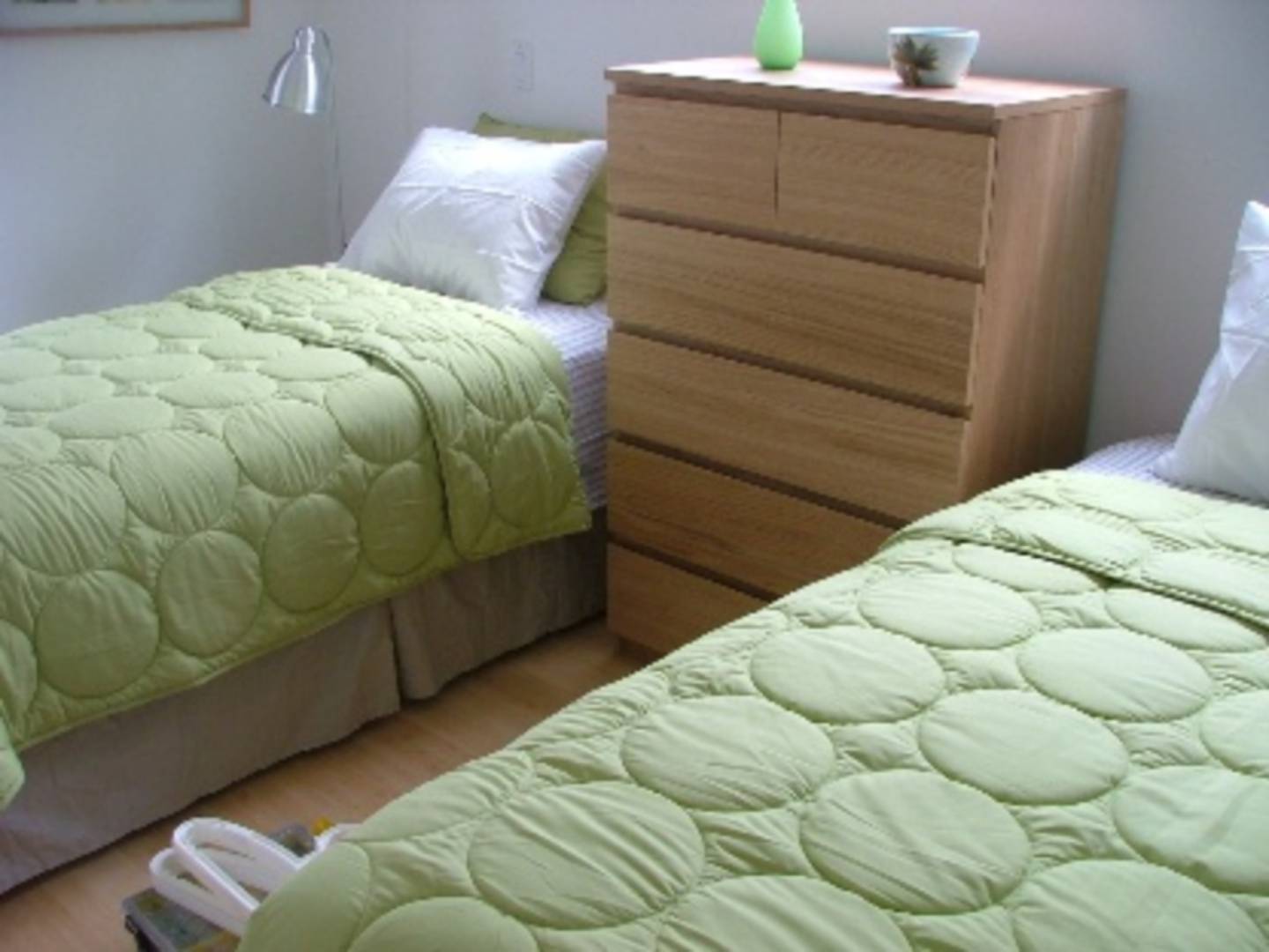 9 Cliff Drive Sag Harbor, NY 11963 - Photo 5 of 7 a bed sitting in a bedroom next to a window