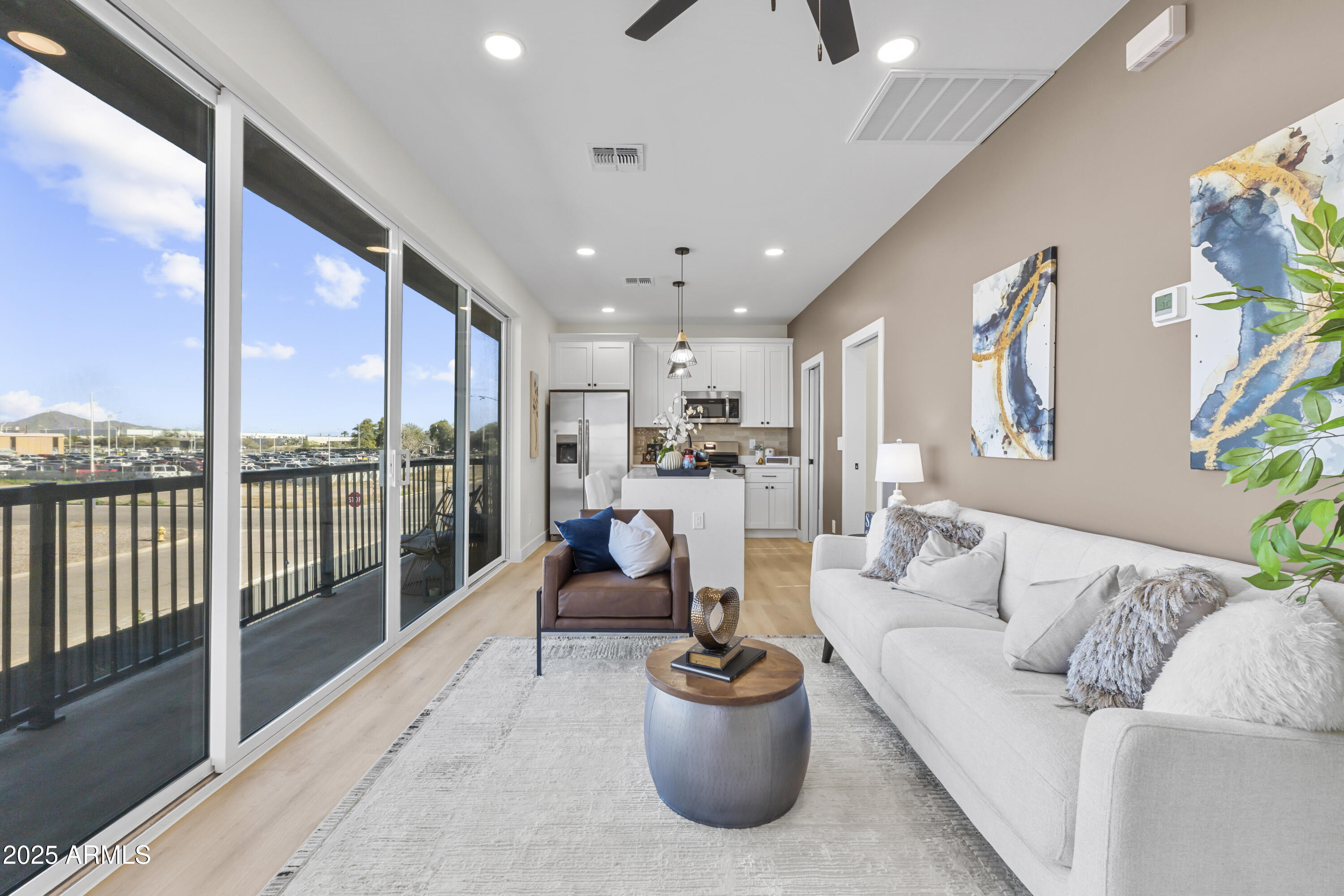 1502 South 14th Street Phoenix, AZ 85034 - Photo 2 of 43 a living room with furniture and a floor to ceiling window or wooden floor