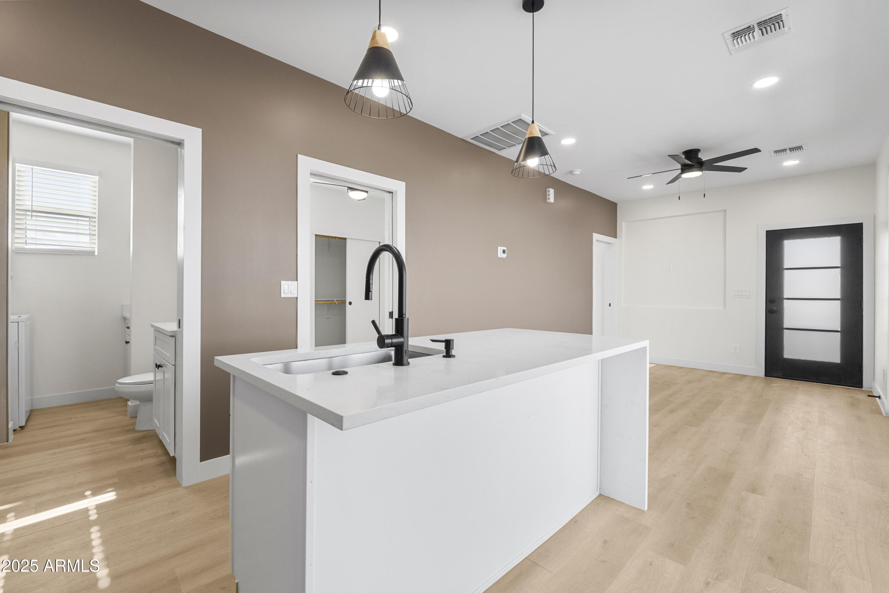 1502 South 14th Street Phoenix, AZ 85034 - Photo 32 of 43 a view of a kitchen with a sink and chandelier