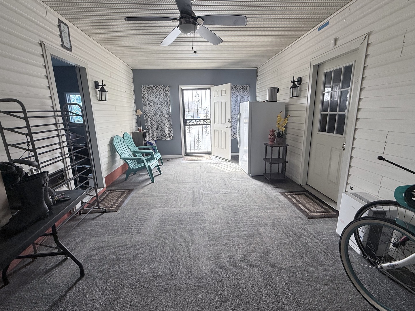 602 William Street Sesser, IL 62884 - Photo 12 of 39 a living room with furniture a flat screen tv and a large window