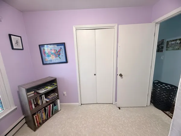 a workspace with furniture and a window