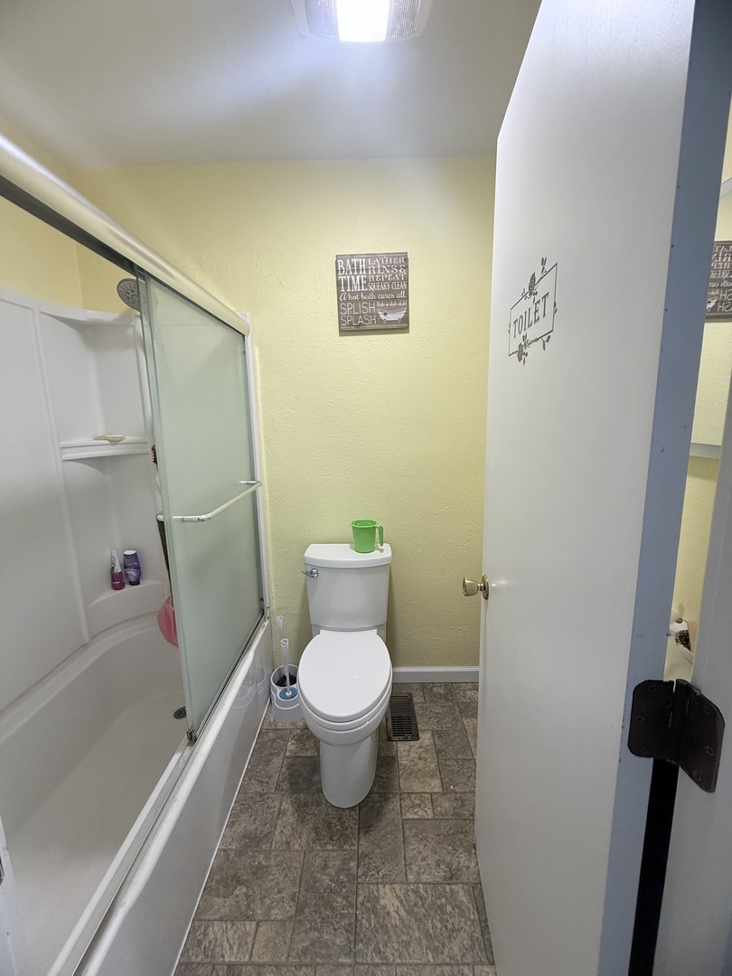 602 William Street Sesser, IL 62884 - Photo 33 of 39 a bathroom with a toilet and a shower