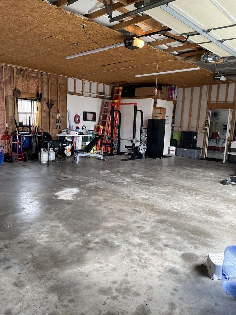 602 William Street Sesser, IL 62884 - Photo 4 of 39 a view of a garage with parked cars