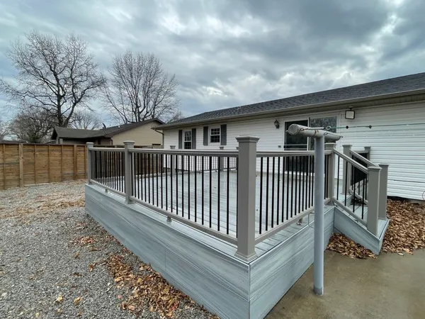 a view of a house with a roof deck