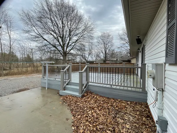 a view of a porch with a bench