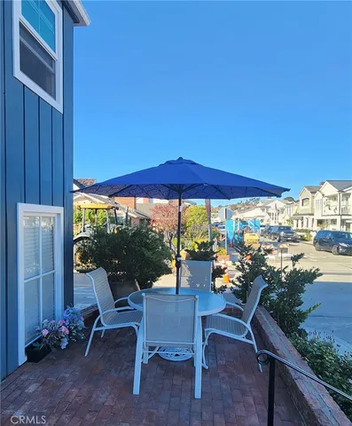 a view of a outdoor seating area with furniture
