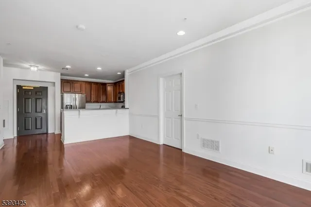 a view of kitchen with wooden floor