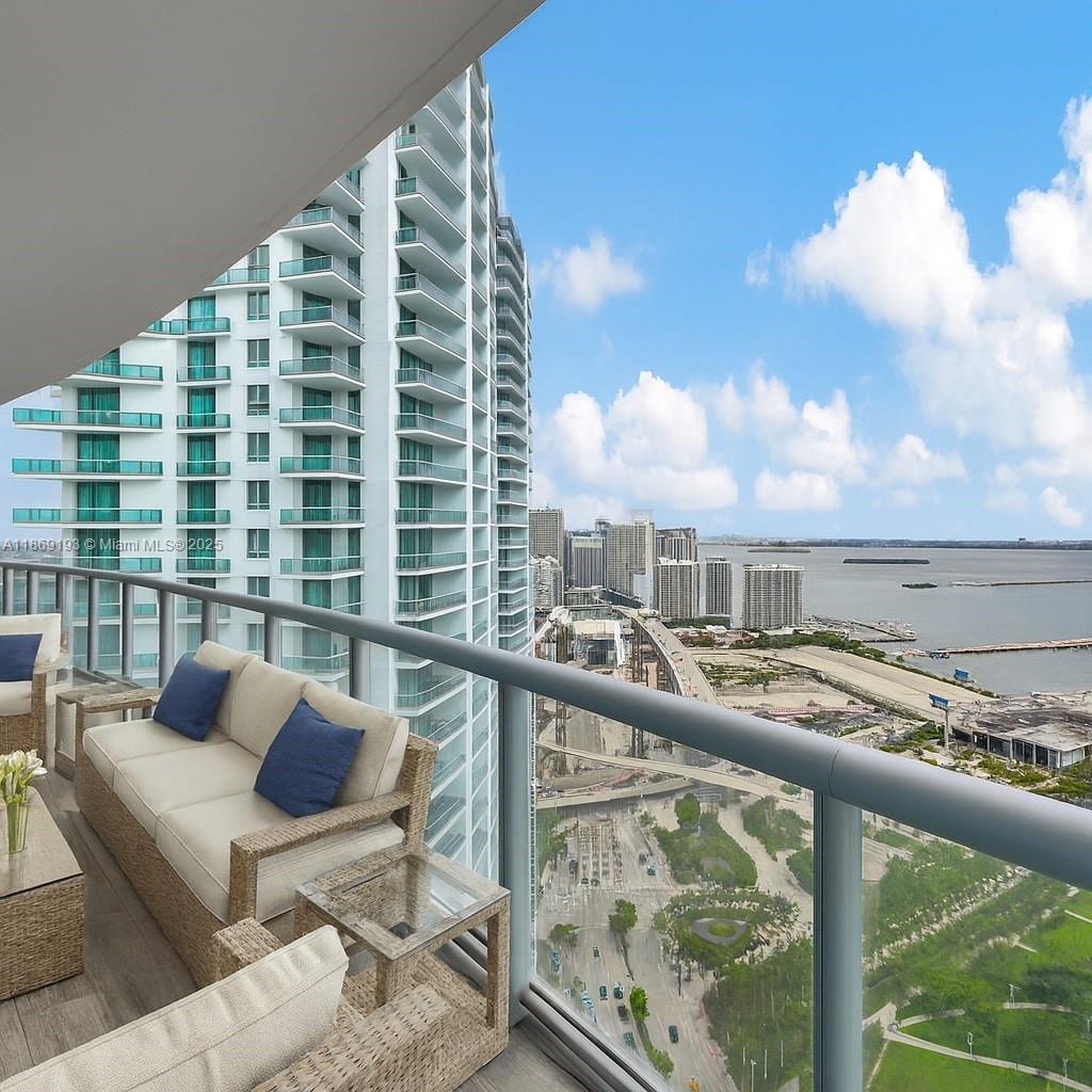 888 Biscayne Boulevard, Unit 5010 Miami, FL 33132 - Photo 2 of 18 a view of balcony with couch