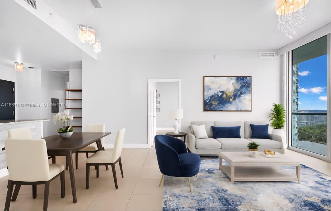 888 Biscayne Boulevard, Unit 5010 Miami, FL 33132 - Photo 4 of 18 a living room with furniture and a painting on the wall