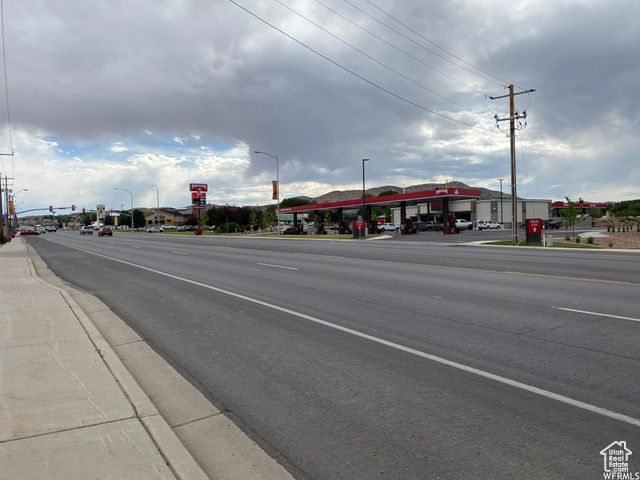 1683 West W Highway Vernal, UT 84078 - Photo 6 of 8 View of asphalt road with sidewalks, street lighting, and curbs