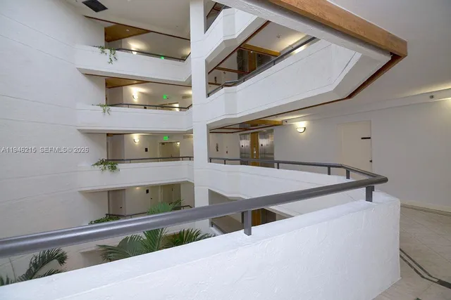 a room with lots of wooden cabinets and a wooden floors