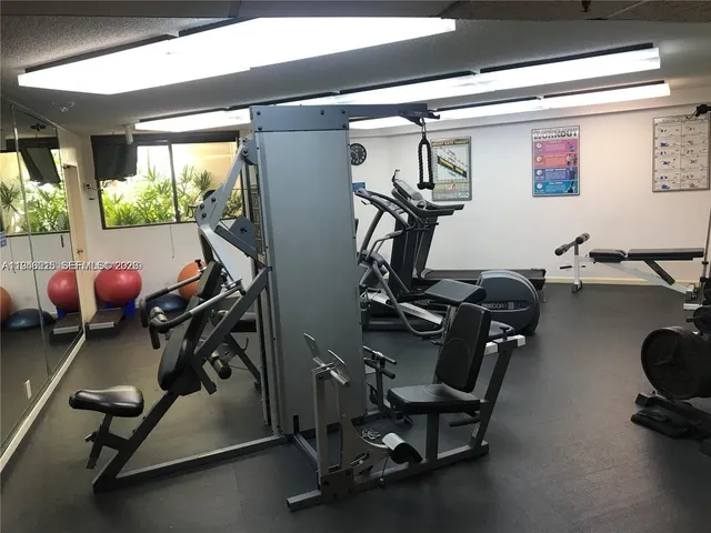 a view of a room with gym equipment