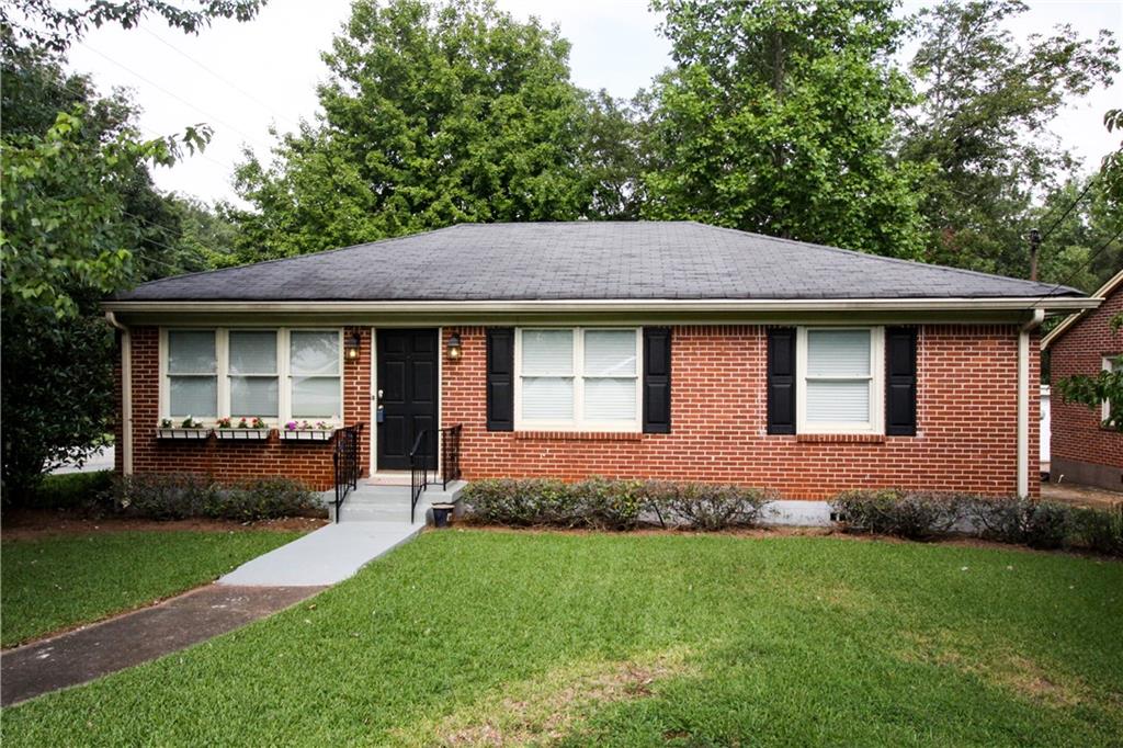 1235 Walker Drive Decatur, GA 30030 - Photo 1 of 1 EXTERIOR VIEW - FRONT OF 4-SIDED BRICK PROPERTY LOCATED AT 1235 WALKER DRIVE, DECATUR, GA 30030.