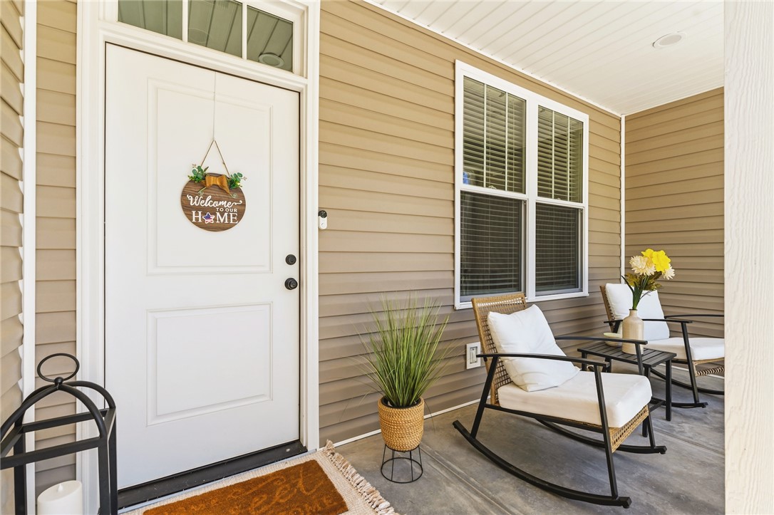 502 Canebrake Drive Anderson, SC 29621 - Photo 3 of 39 Welcome to a charming entry with inviting outdoor seating, perfect for quiet moments.
