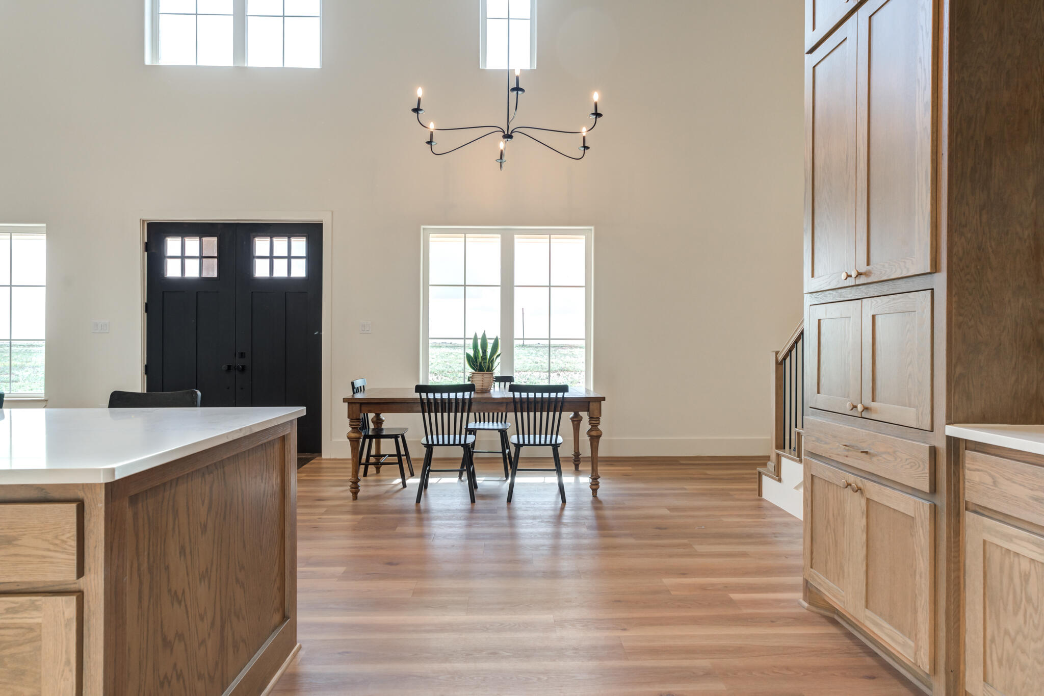 1735 Lovebird Road Lubbock, TX 79407 - Photo 13 of 44 a view of a a dining room with furniture window and wooden floor