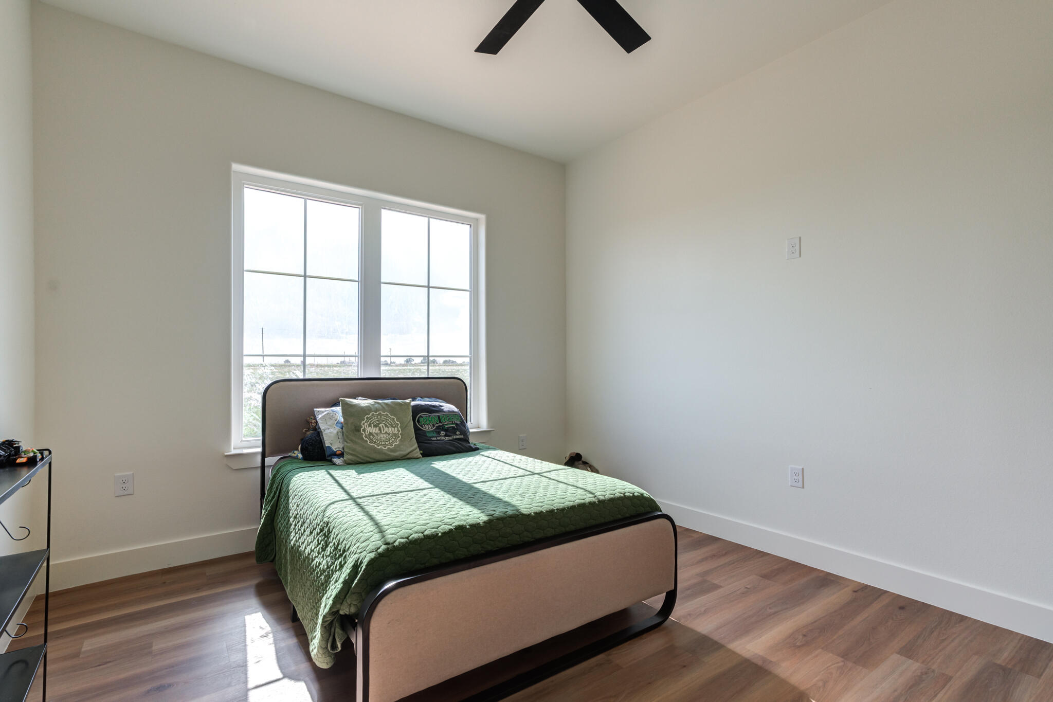 1735 Lovebird Road Lubbock, TX 79407 - Photo 34 of 44 a bedroom with a bed and a window