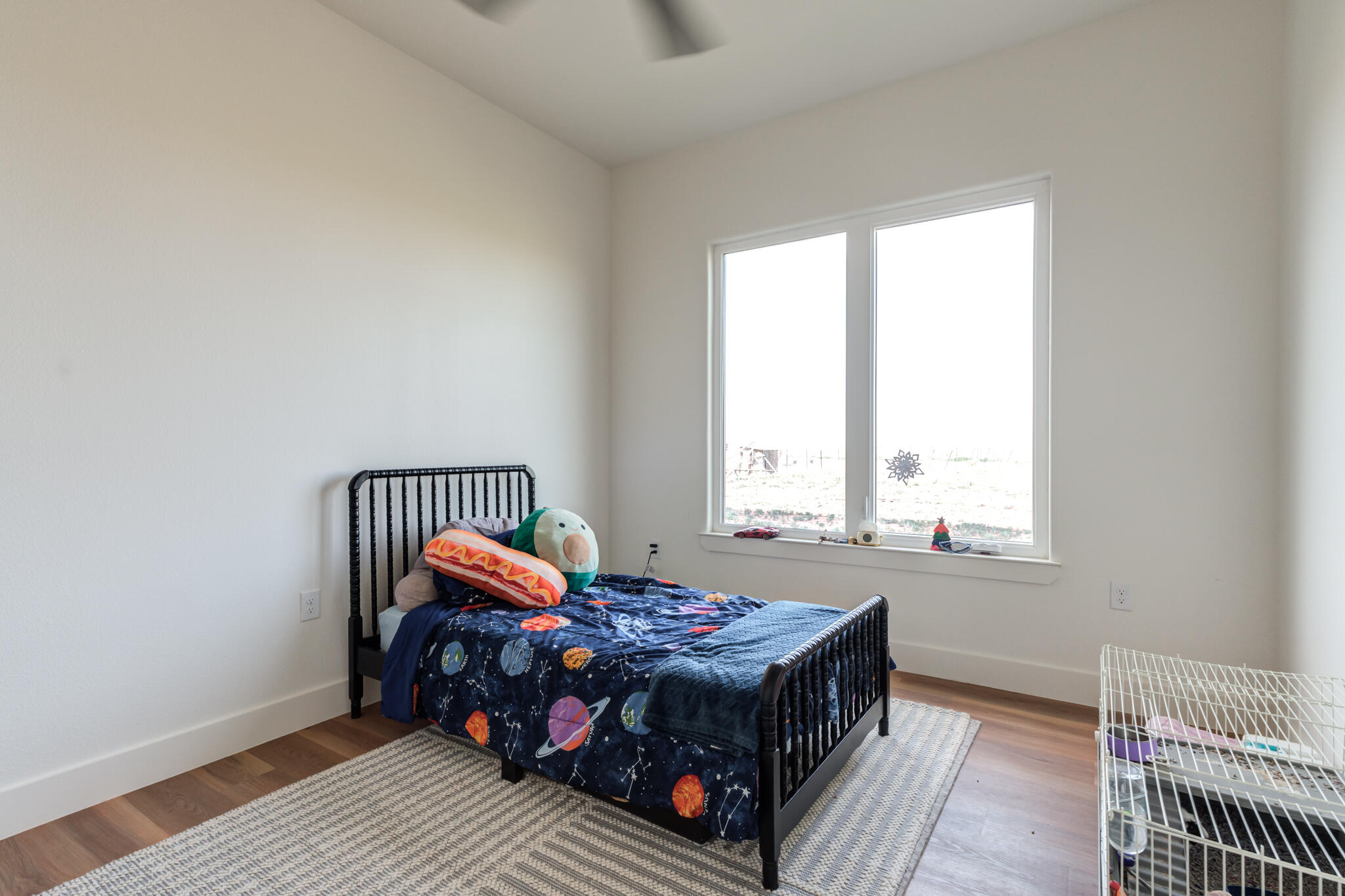1735 Lovebird Road Lubbock, TX 79407 - Photo 35 of 44 a bedroom with a bed and window