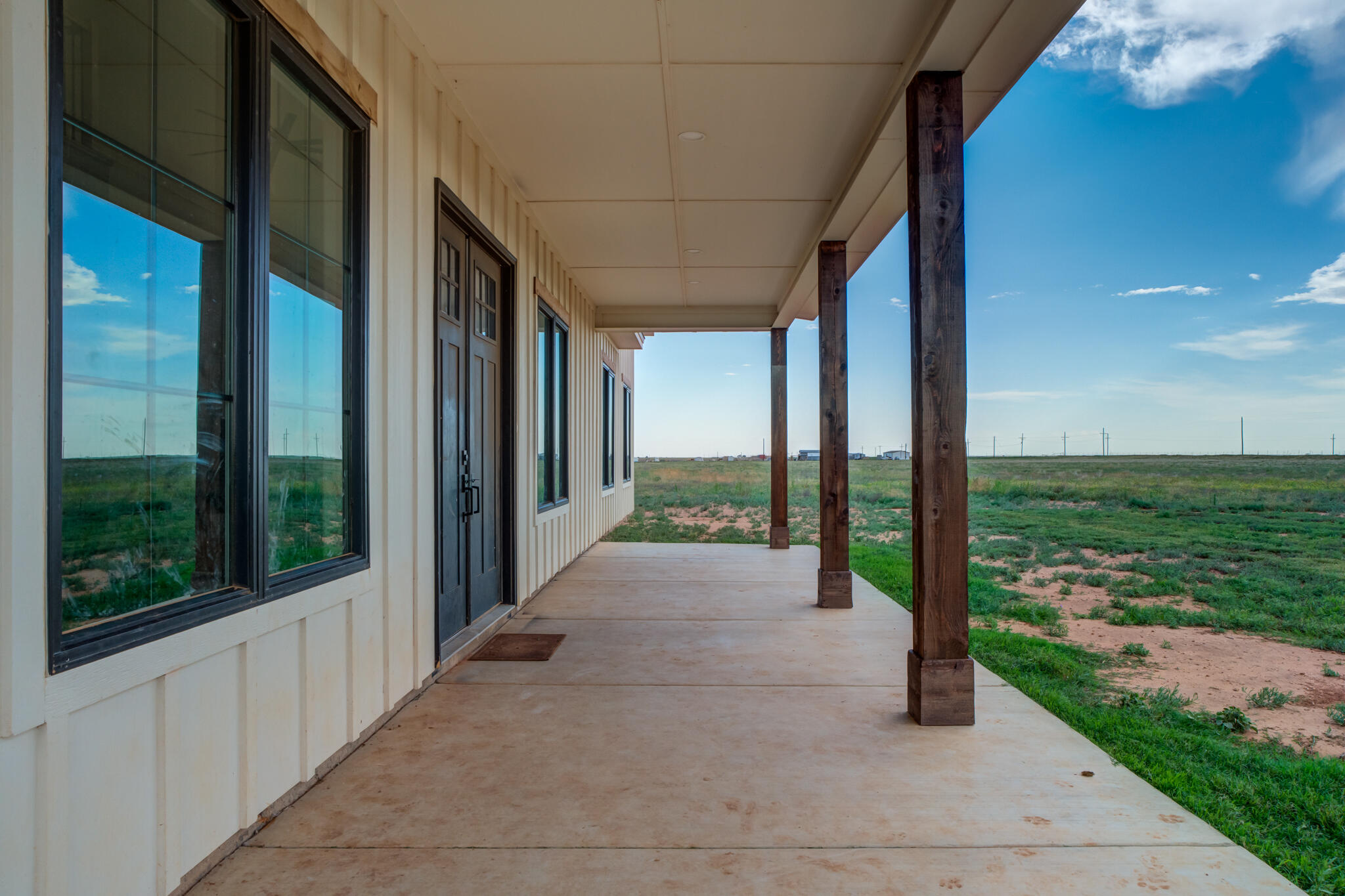 1735 Lovebird Road Lubbock, TX 79407 - Photo 4 of 44 a porch with a view of the next to yard
