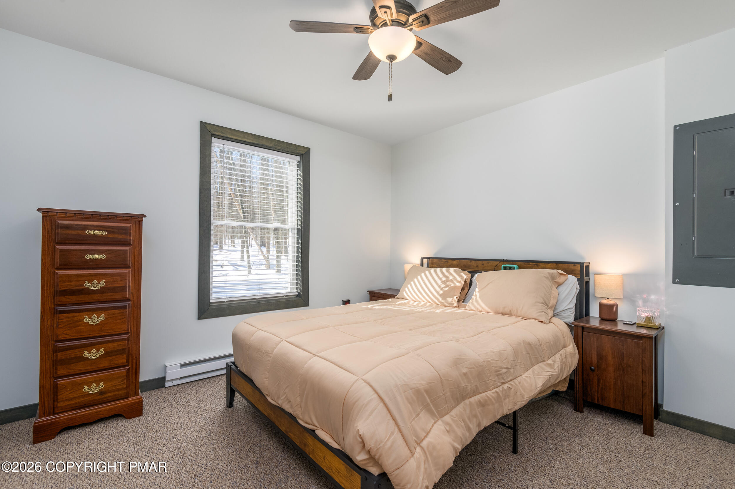 1819 Stag Run Pocono Lake, PA 18347 - Photo 12 of 40 a bedroom with a bed and a dresser
