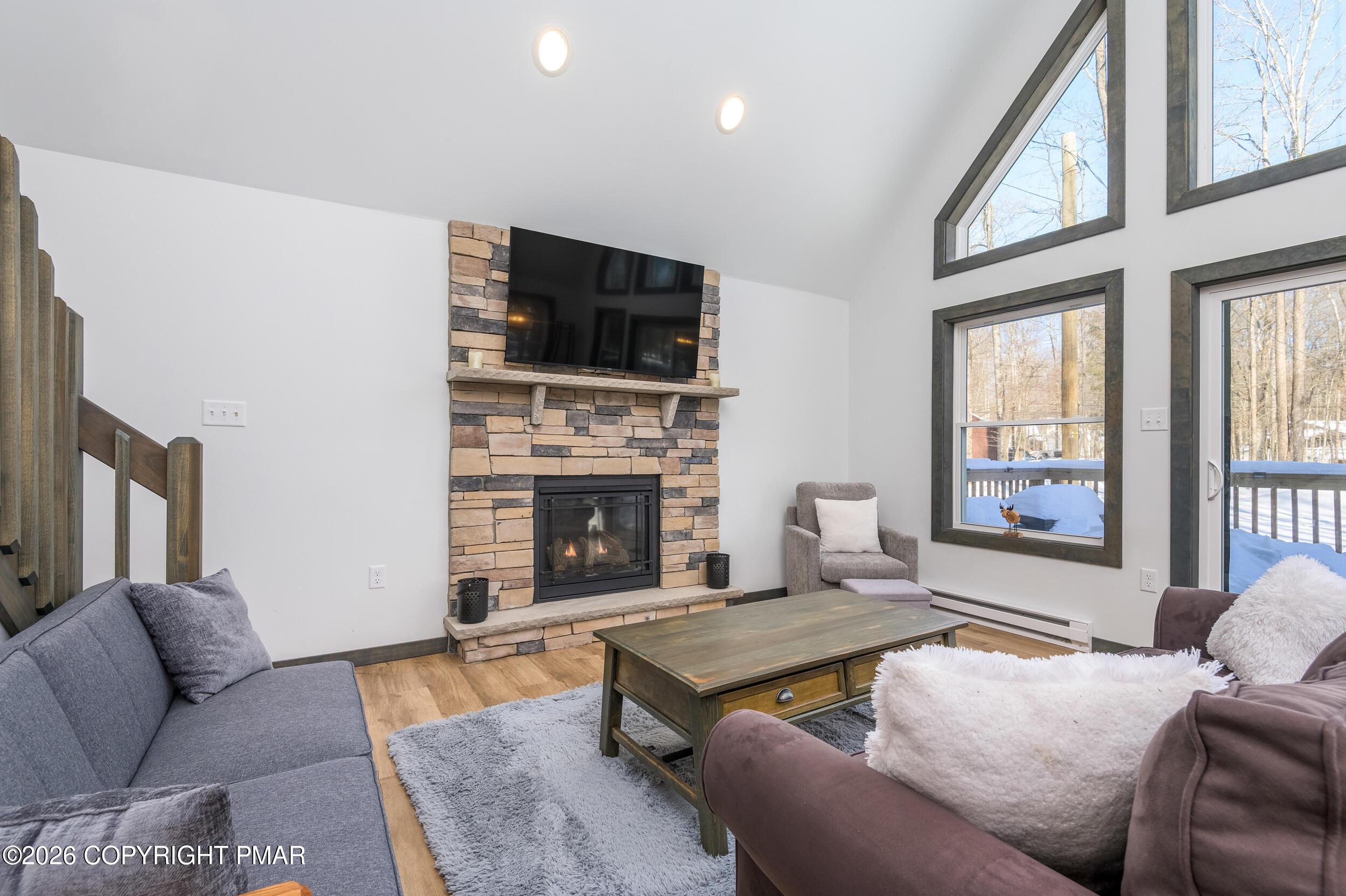 1819 Stag Run Pocono Lake, PA 18347 - Photo 2 of 40 a living room with furniture or fireplace and a flat screen tv