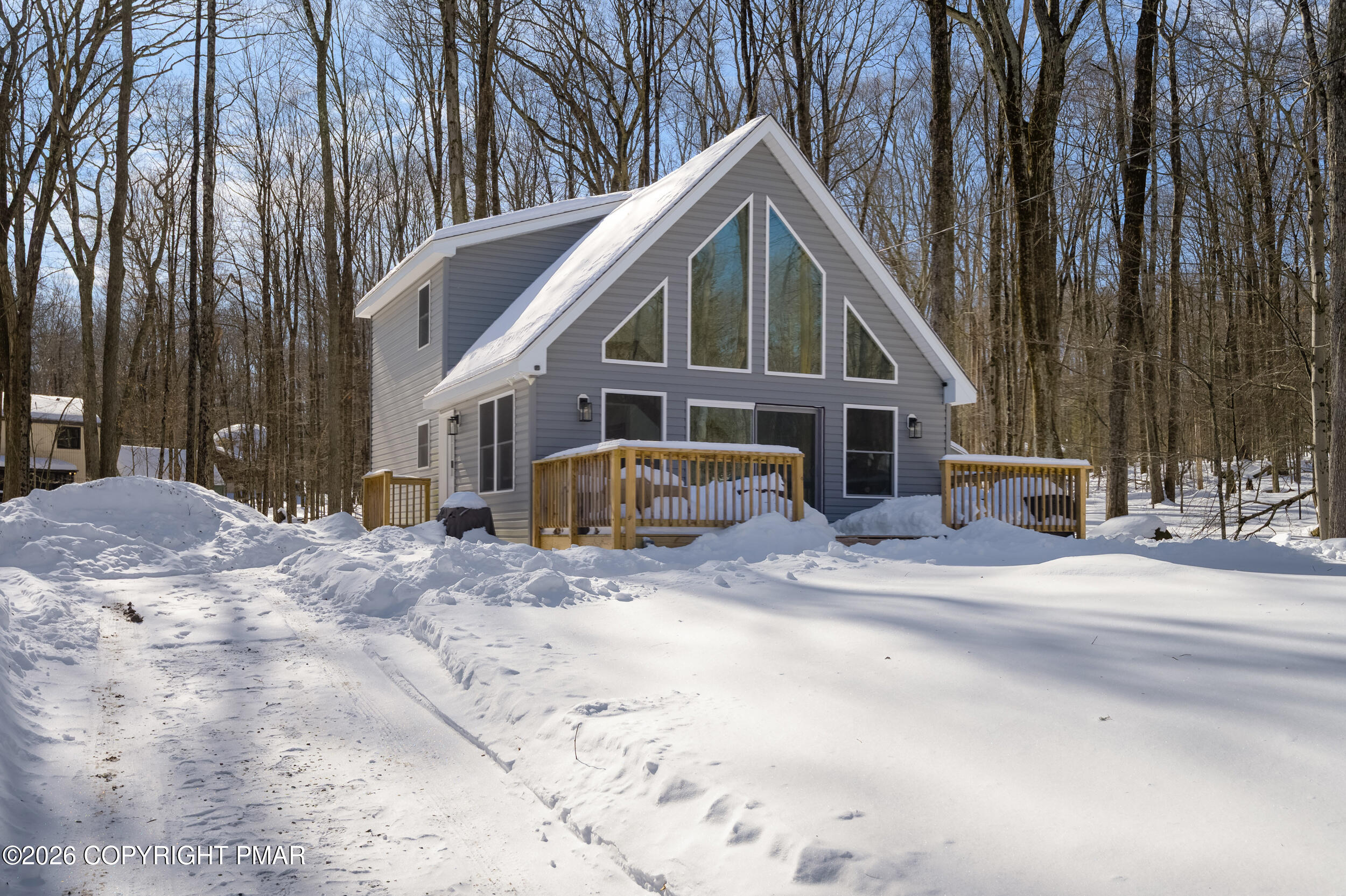 1819 Stag Run Pocono Lake, PA 18347 - Photo 28 of 40 a front view of a house with a yard
