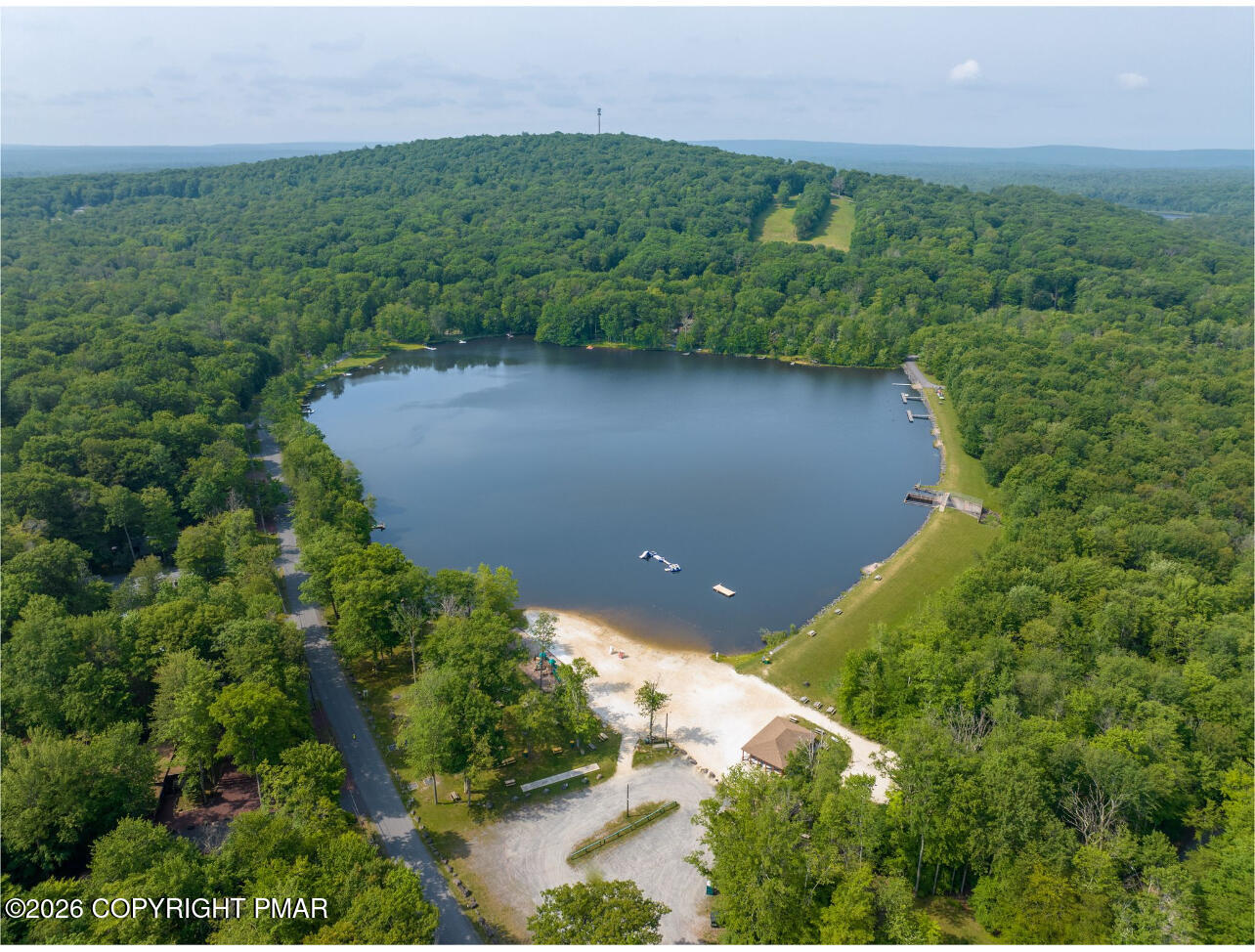 1819 Stag Run Pocono Lake, PA 18347 - Photo 40 of 40 an aerial view of a house with a yard