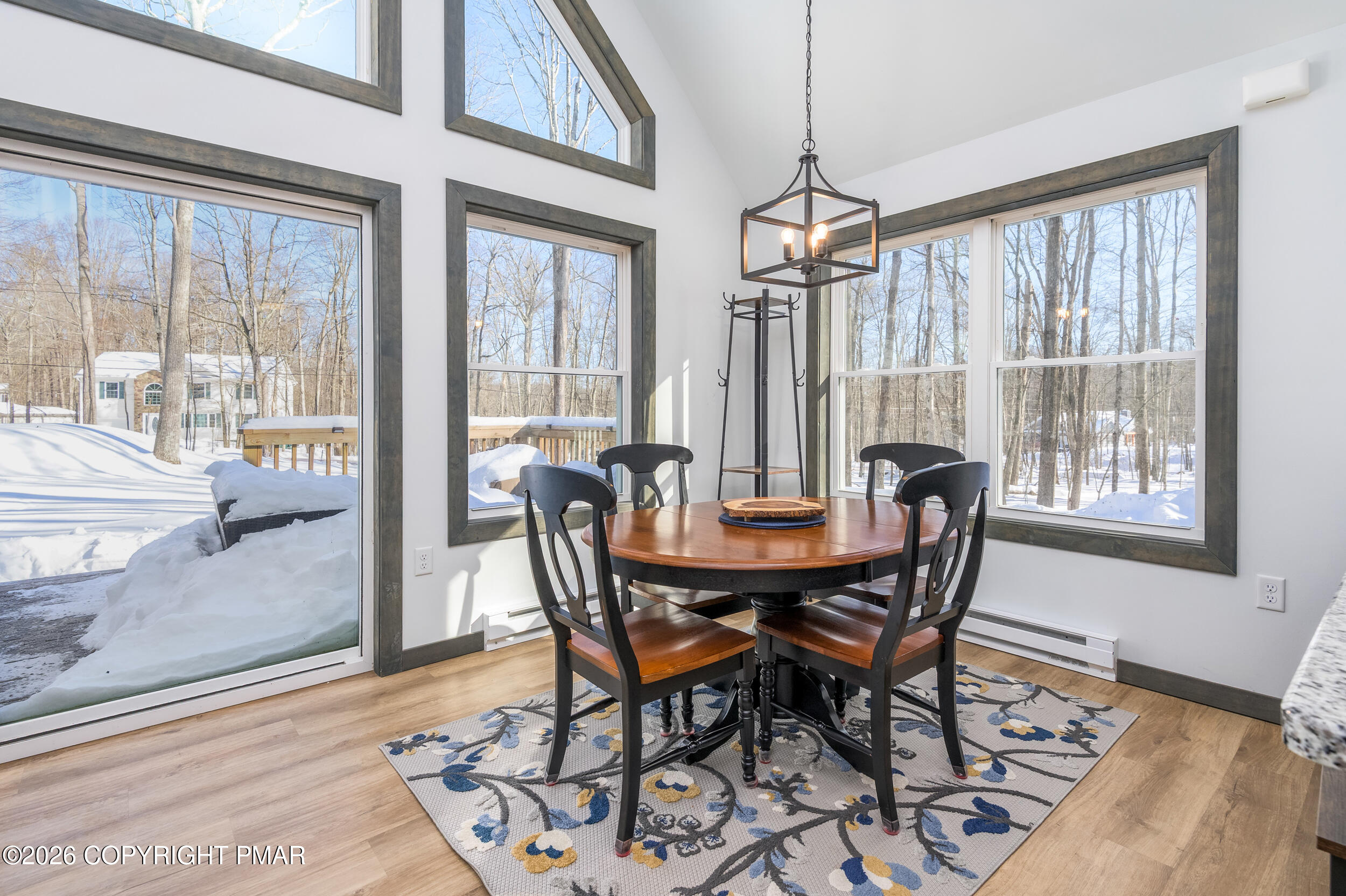 1819 Stag Run Pocono Lake, PA 18347 - Photo 6 of 40 a view of a dining room with furniture window and wooden floor