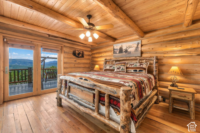 1701 Oak Road Coalville, UT 84017 - Photo 27 of 71 Wood-paneled walls and ceiling with exposed log beams