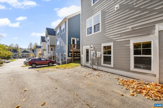 a car parked in front of a house