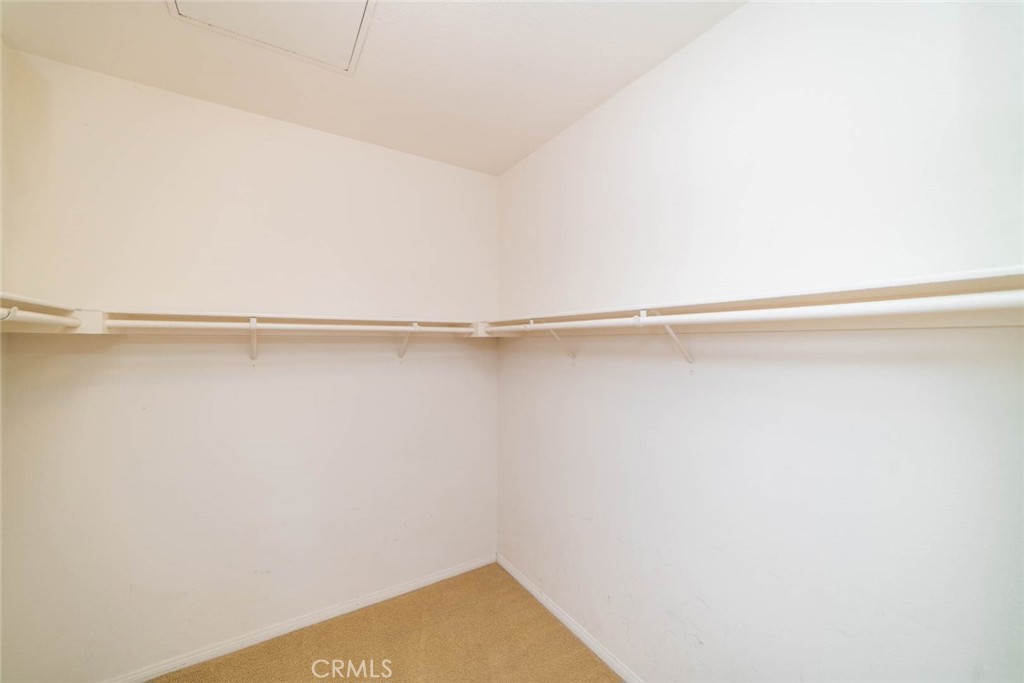 368 Quail Ridge Irvine, CA 92603 - Photo 18 of 23 a view of small space with racks on the wall